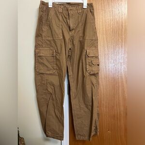 American Eagle cargo tan pants with draw strings on the bottom of legs.